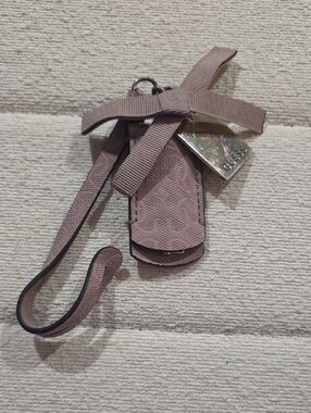 Guess Mauve Bow Charm Keyring with Silver Tag